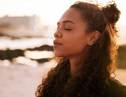 A woman enjoying the outdoors.